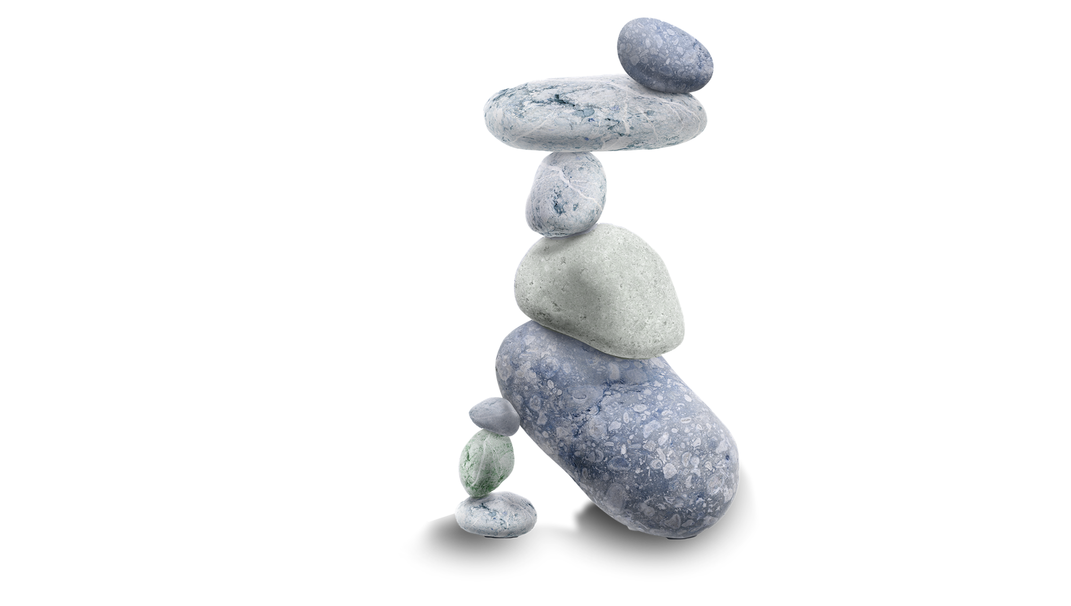 Balanced stack of stones representing stability and recovery.